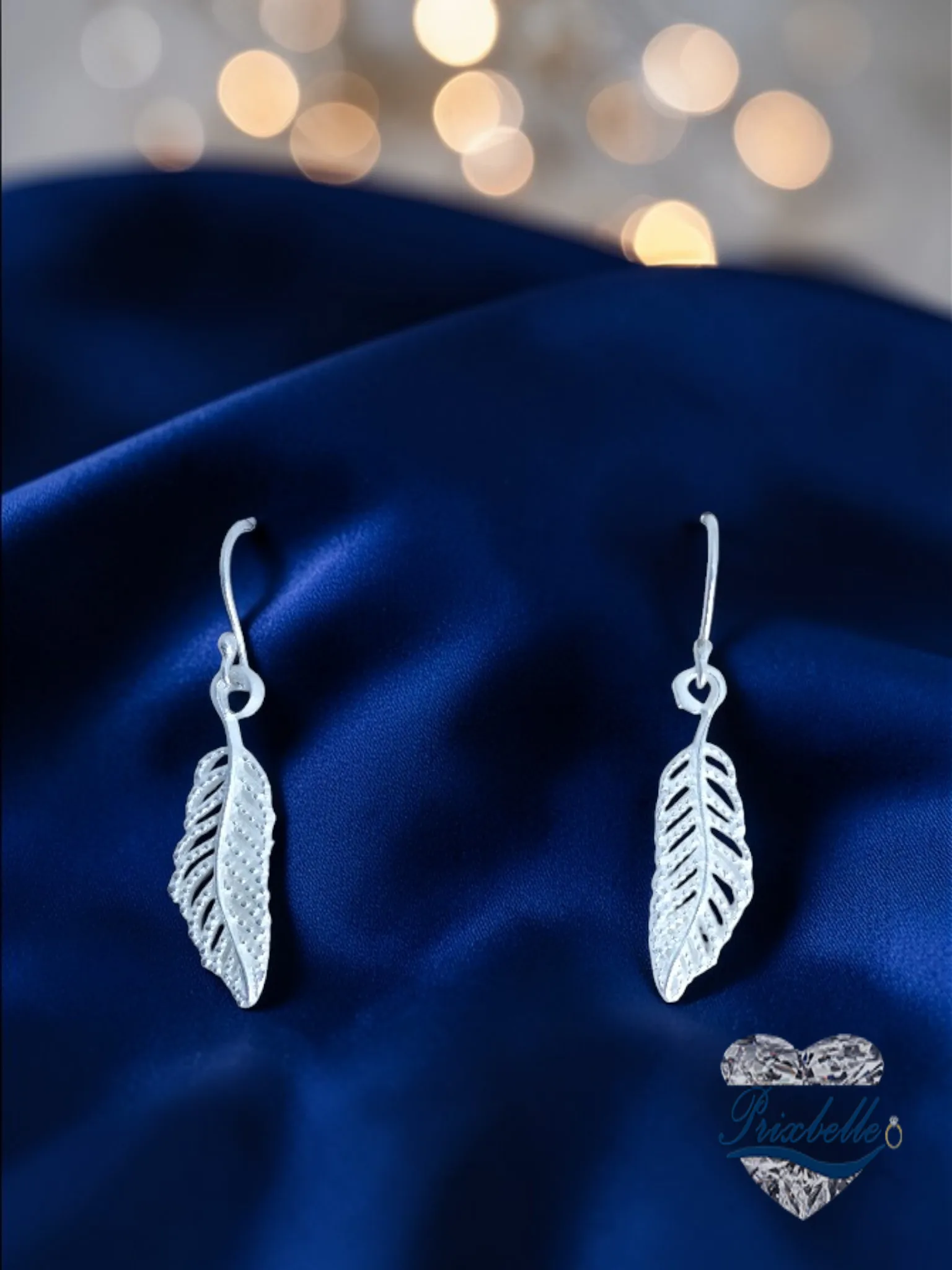 Aretes largos en forma de hoja