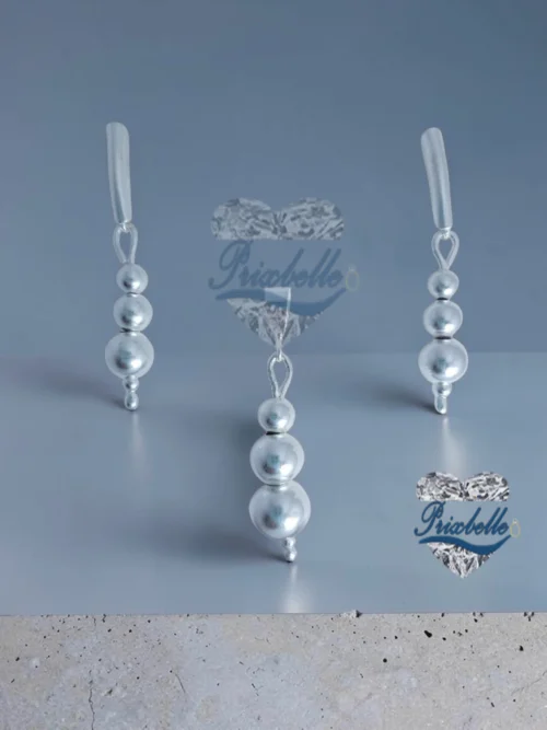 conjunto de plata en forma de bolitas