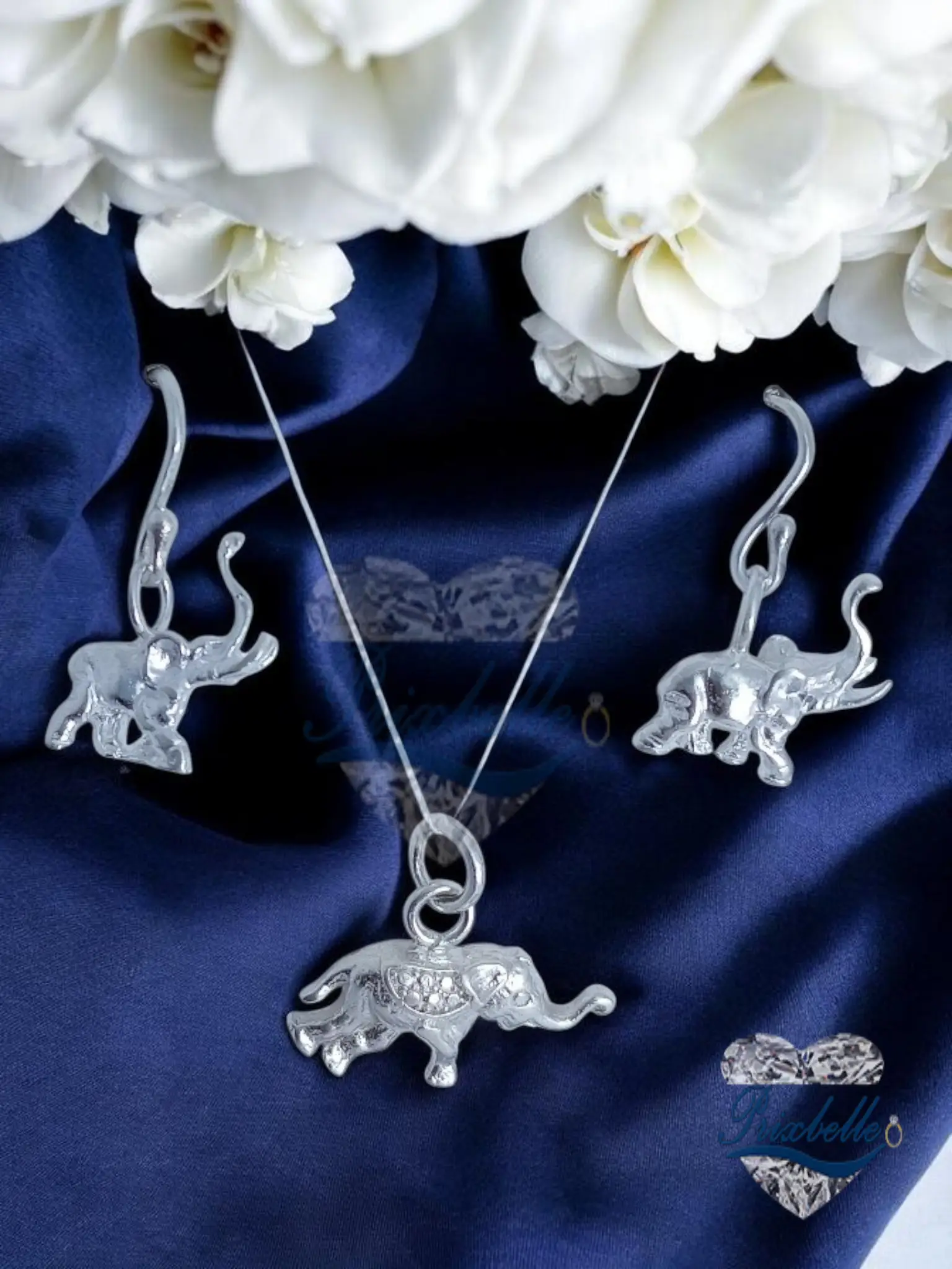 conjunto de plata en forma de elefante
