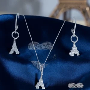 conjunto en plata con figura de la torre eiffel de Francia