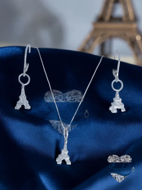 conjunto en plata con figura de la torre eiffel de Francia